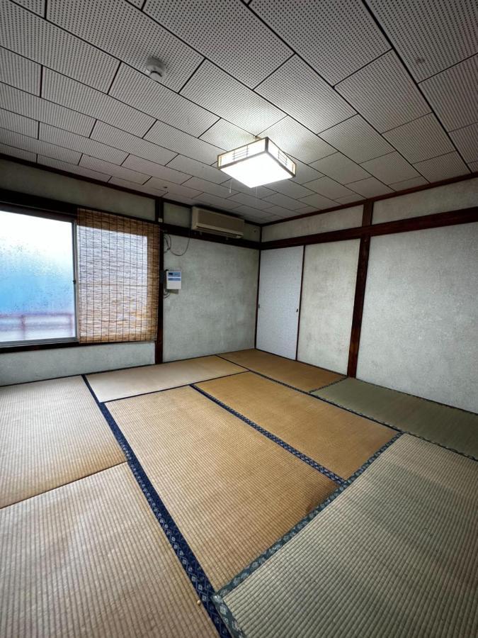 素泊まり民宿とみや Oshima Exterior foto